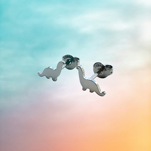 Dinosaur studs -solid titanium- Feature a small and minimal design.
