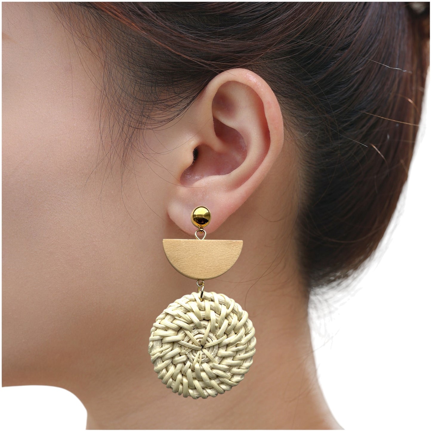 Bohemia white wicker wood magnetic earring on a young woman with white back ground