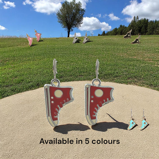 Running Shoe Drop Earrings with a titanium hook on a outside background available in 5 colours