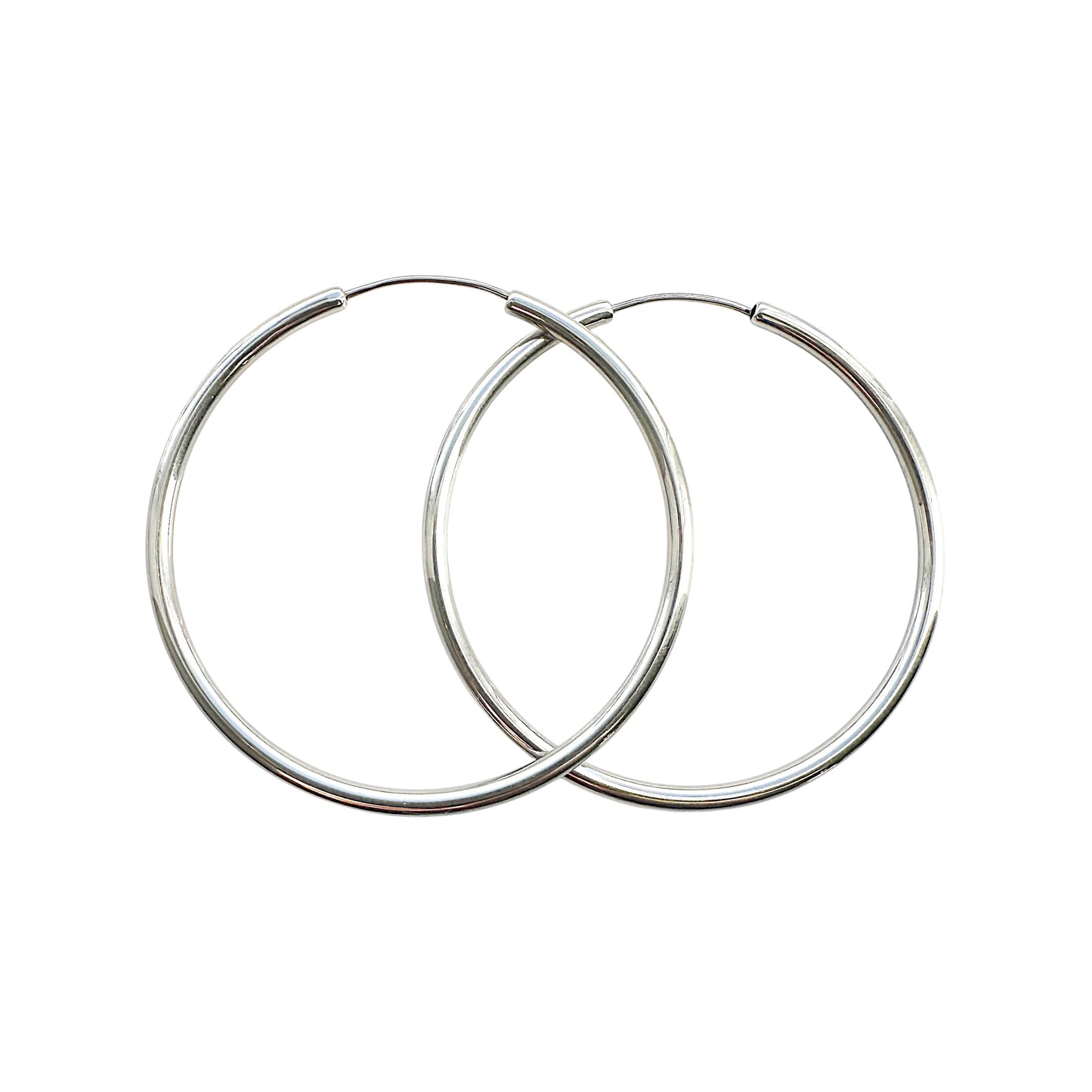 Silver Hoops made with a titanium pin. 45mm titanium earring pair on a white background