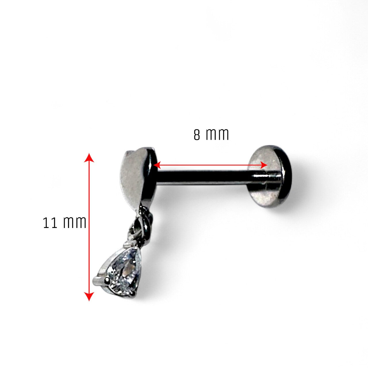 Titanium earring with heart and teardrop hanging gem on a white background measured