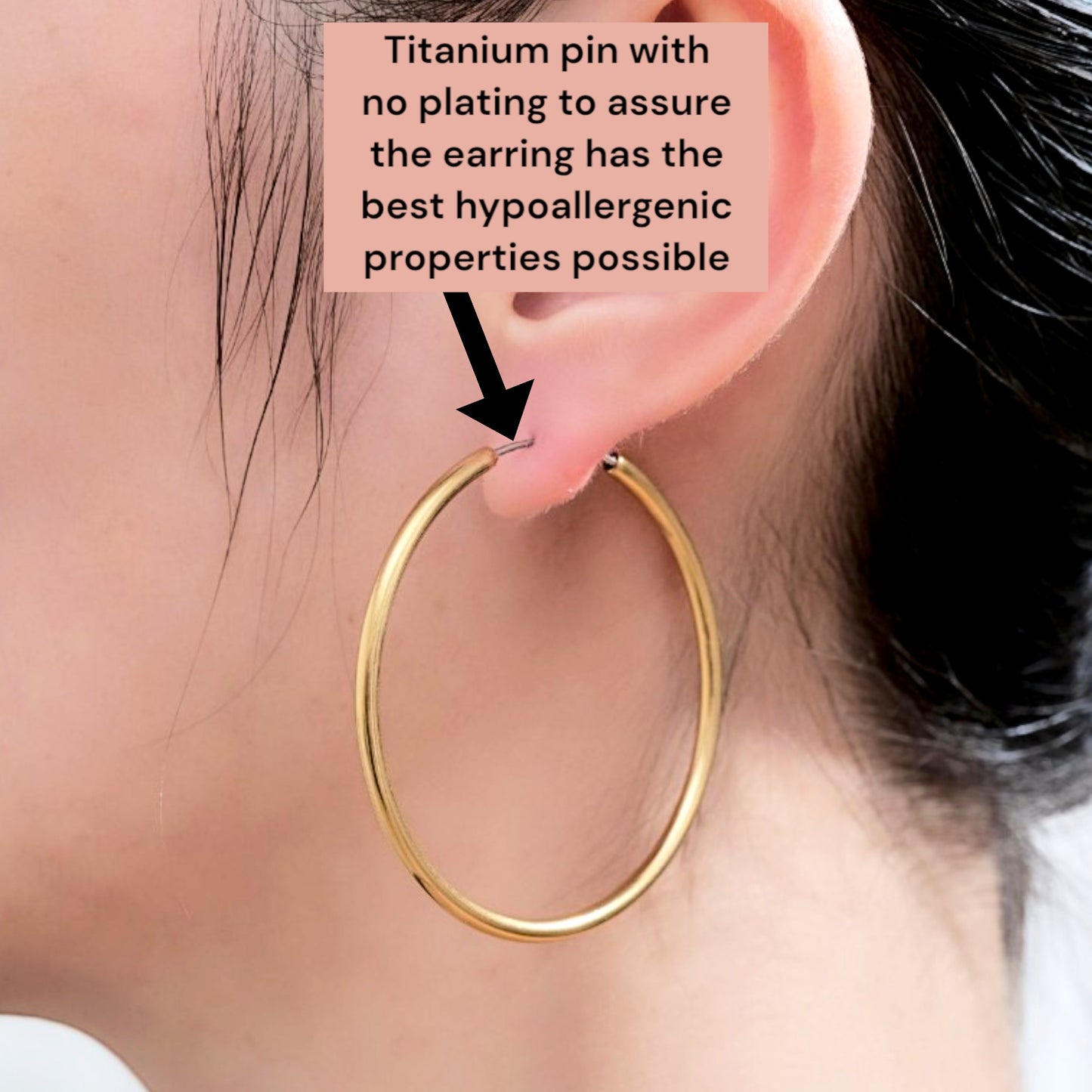 Hoops on a white woman made from titanium. Titanium pin description. Gold large 45mm titanium earring
