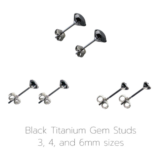 Black Titanium Gem Stud earrings in various sizes on a white background