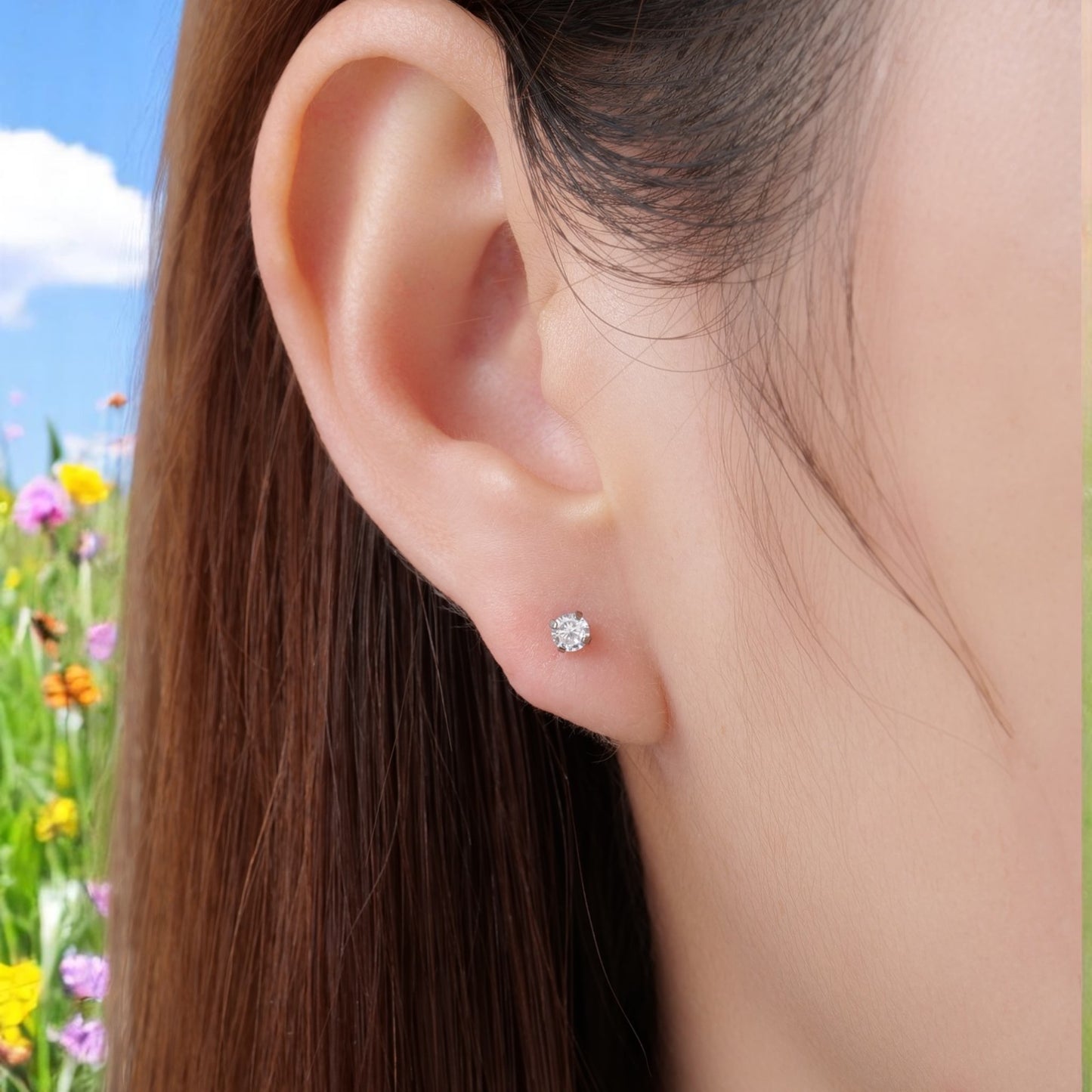 Titanium zirconium 3 mm flatback threadless stud on a white woman in spring closeup