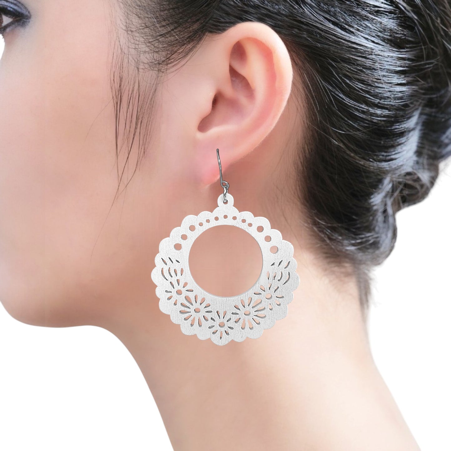Wooden white Floral titanium earrings on a white woman