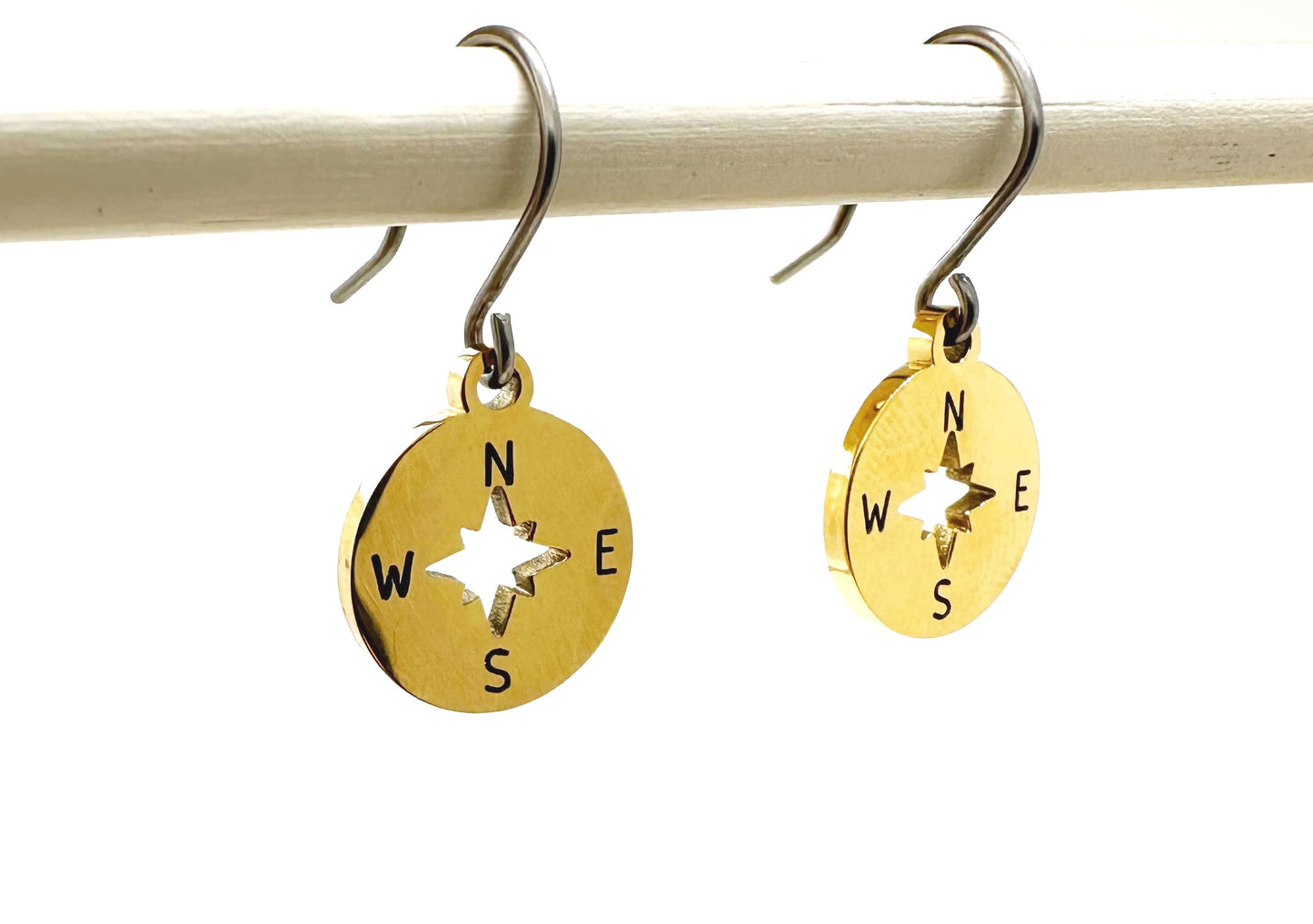Compass earrings with titanium hooks. Shiny Gold