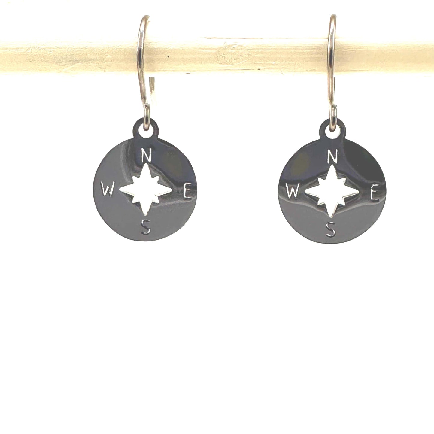 Compass earrings with titanium hooks. Shiny silver