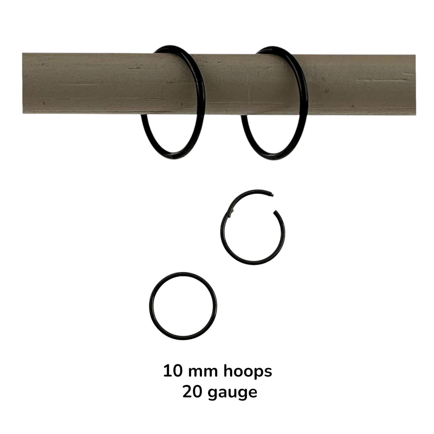 Black anodzed titanium hoop earrings sized on a white background