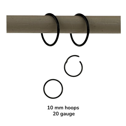 Black anodzed titanium hoop earrings sized on a white background