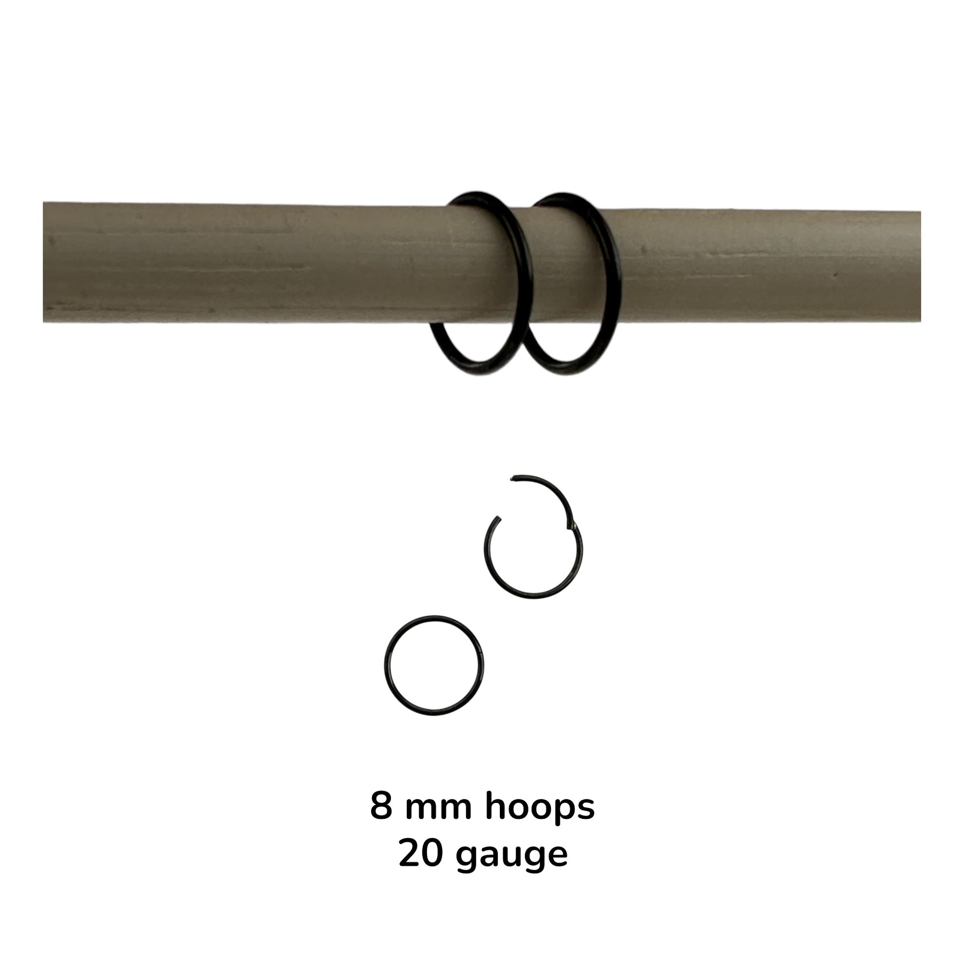 Black titanium hoop  earrings on a rod with text indicating size and gauge