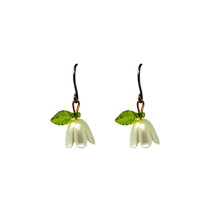 Blue Bell white flower titanium earrings on a white background