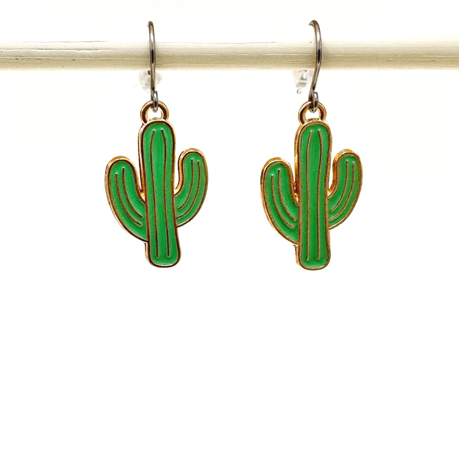 Cactus titanium earrings green on a whit  background