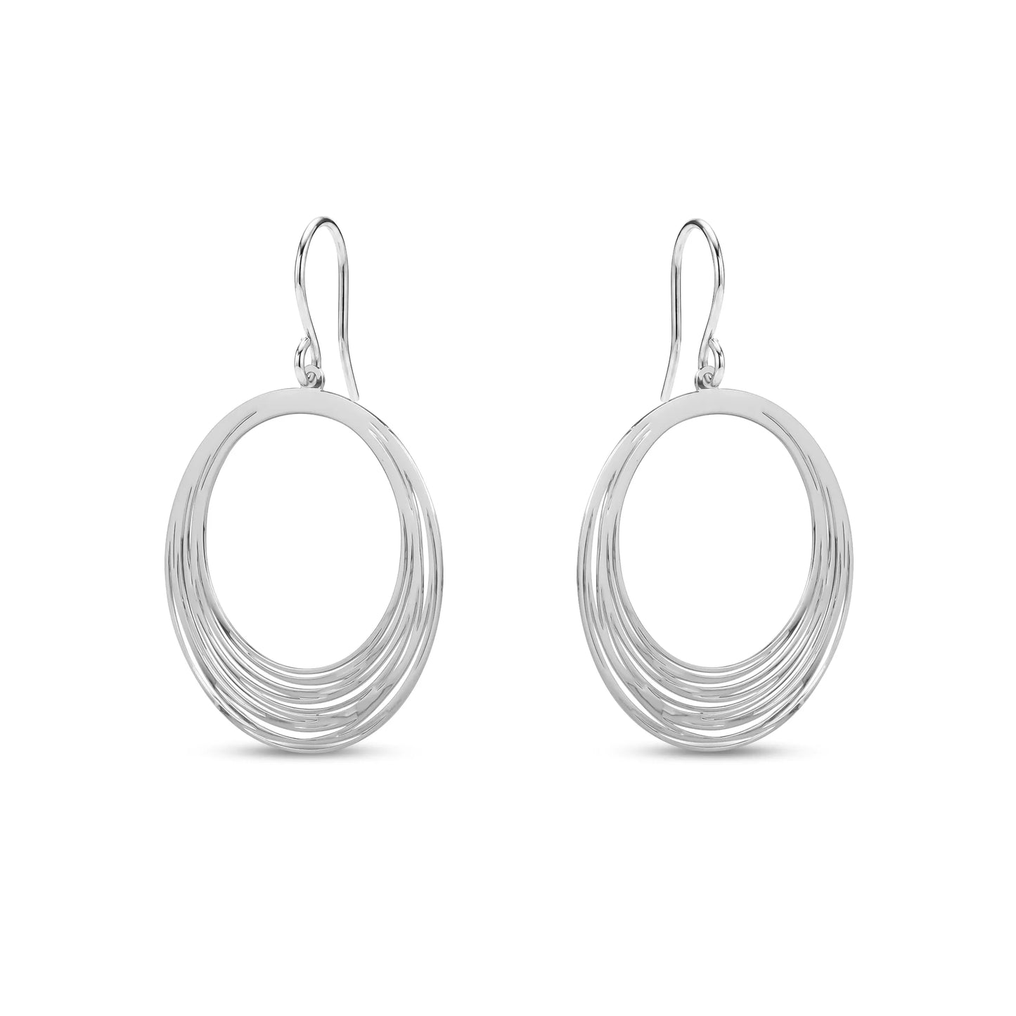 Pair of silver titanium hoop earrings on a white background