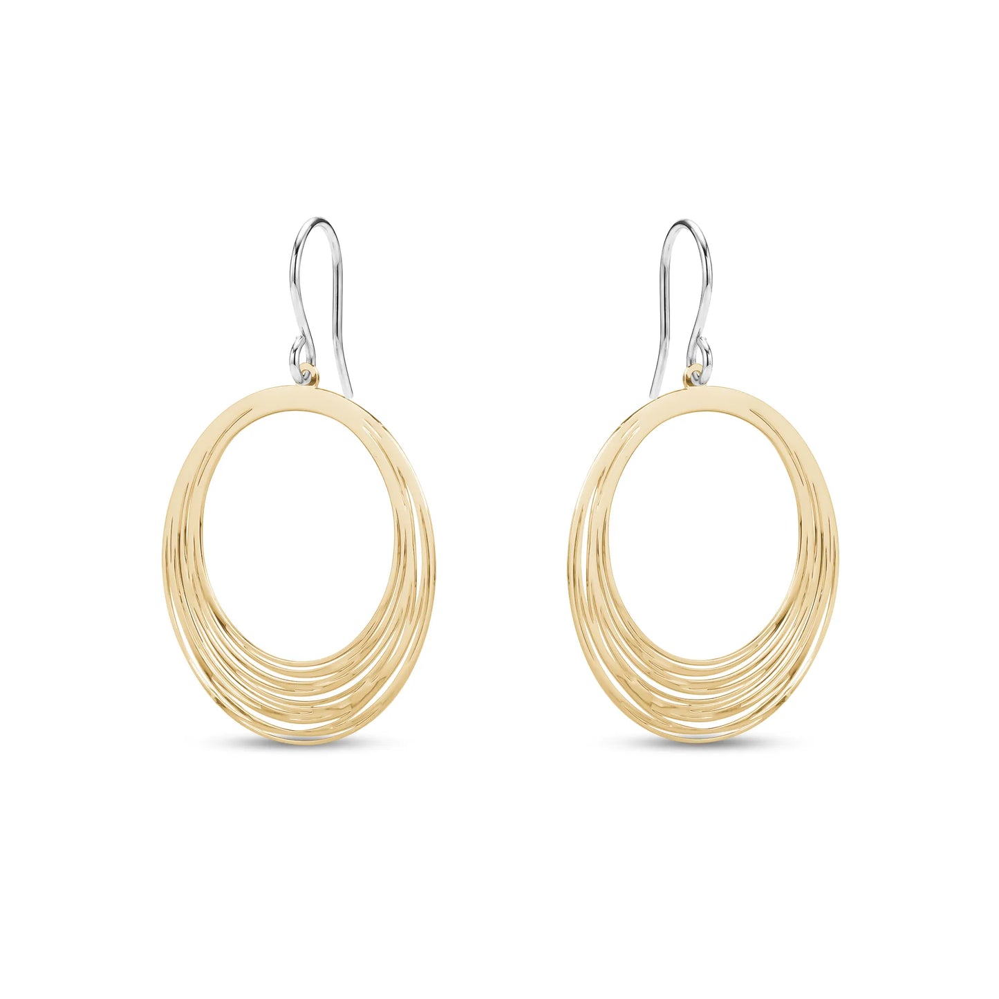 Gold titanium hoop earrings on a white background