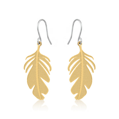 Stylized gold monstera leaf earring with a titanium hook on a white background