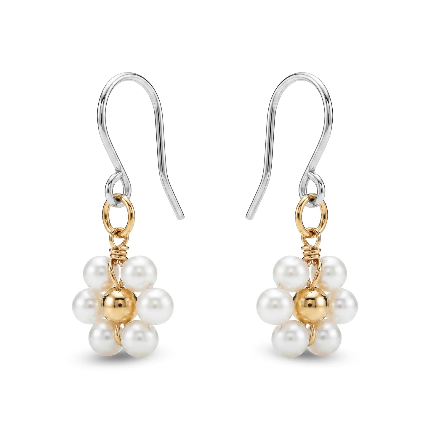 Pair of titanium earrings with pearls and gold accents on a white background