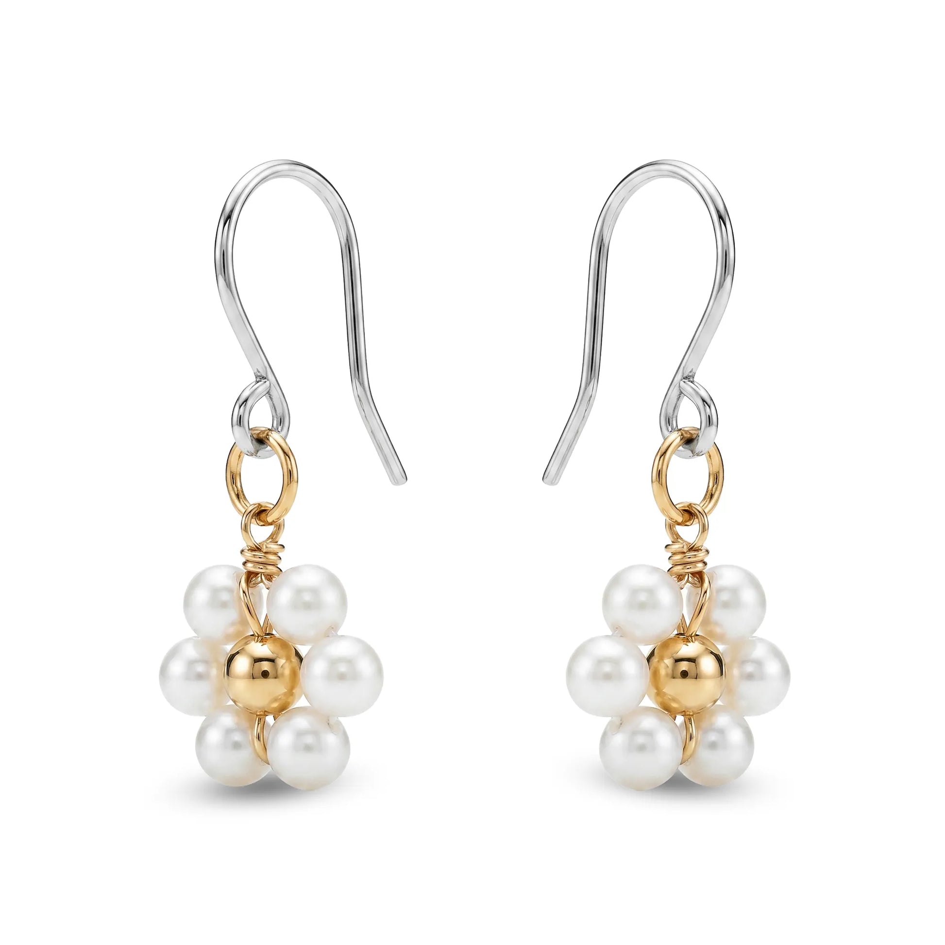 Pair of titanium earrings with pearls and gold accents on a white background
