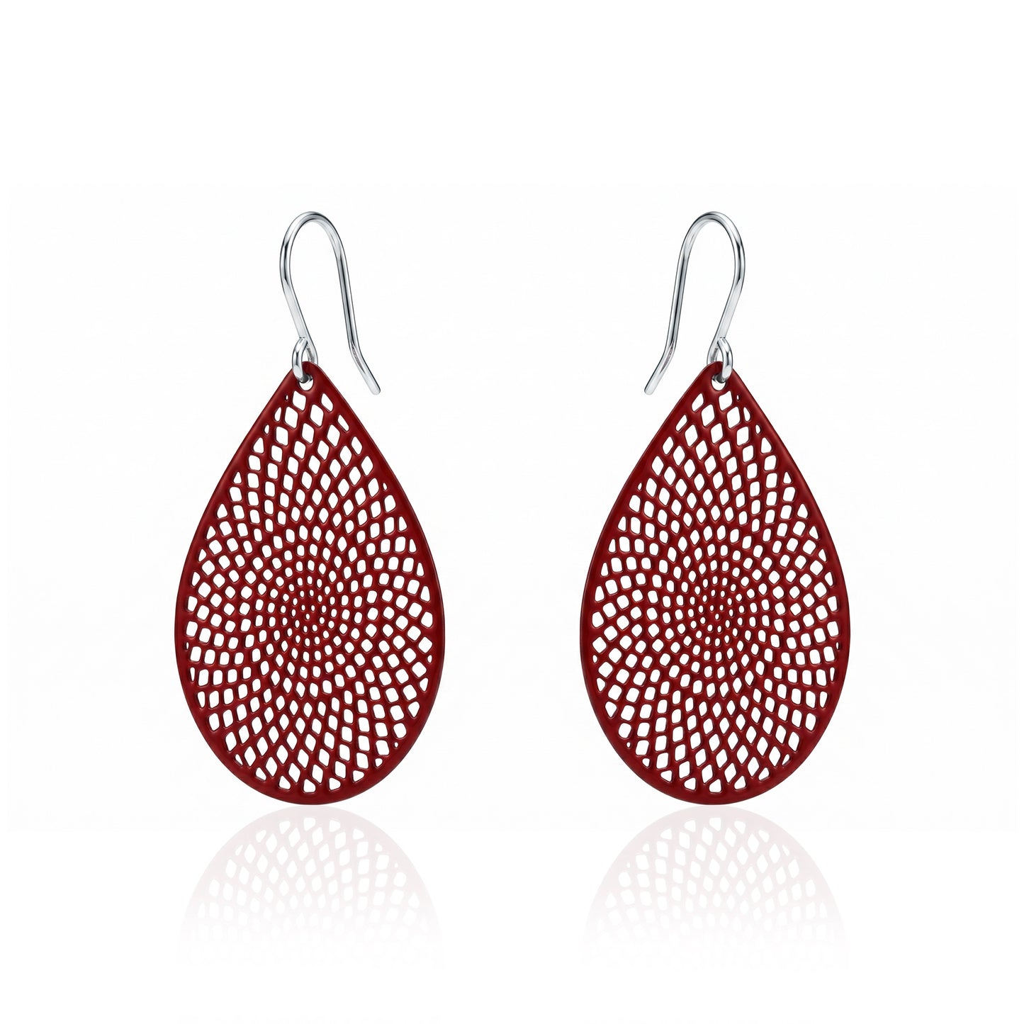 Red teardrop earrings with titanium hook. on a white background