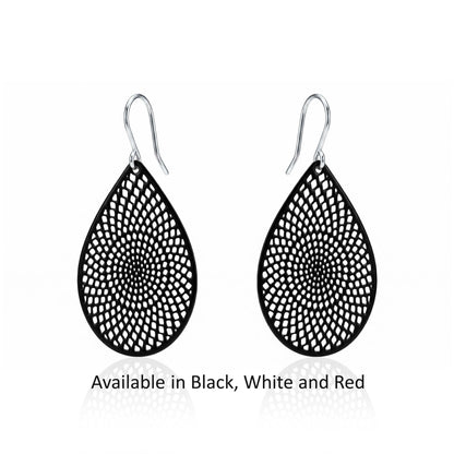 Black, white, Red teardrop earrings with titanium hook. on a white background