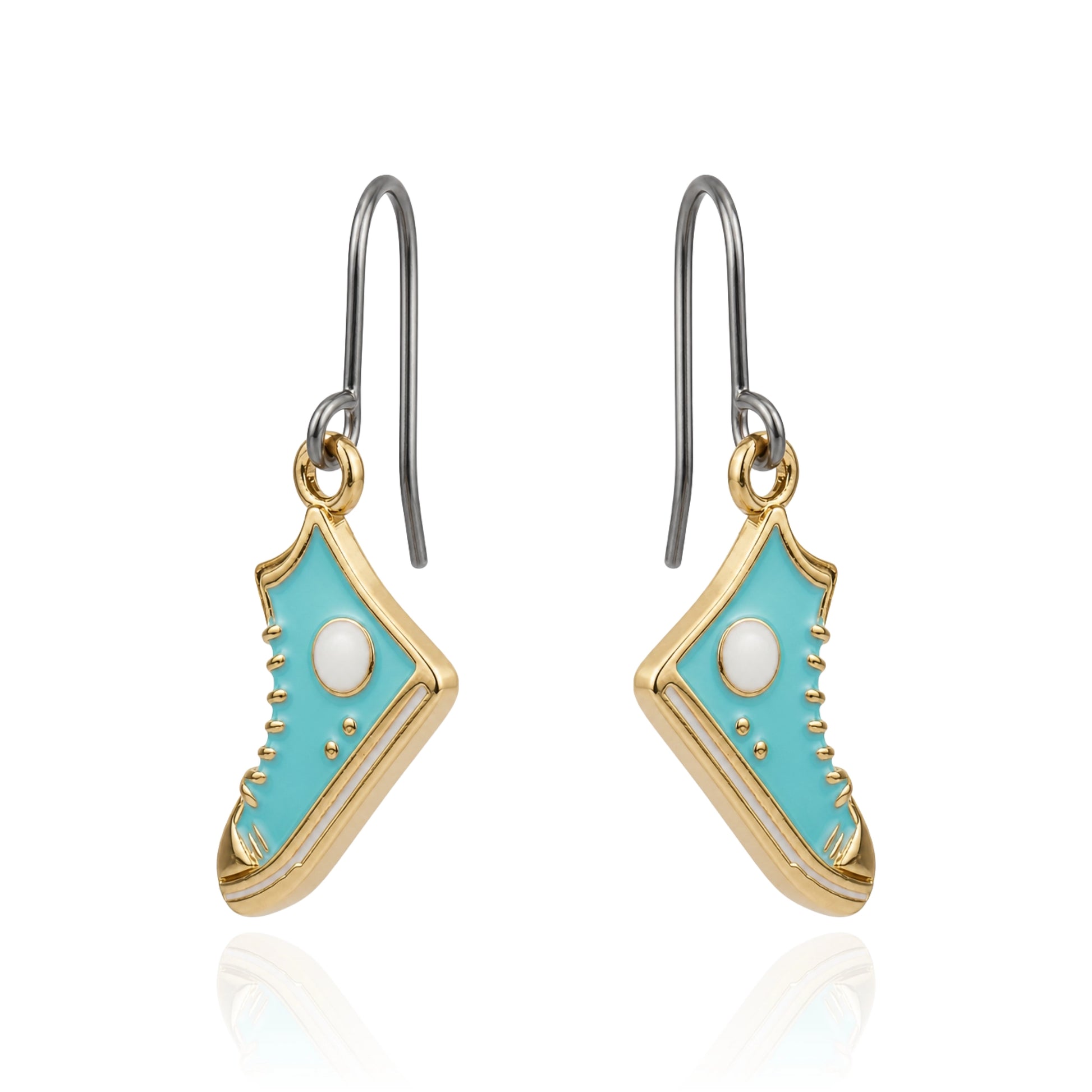 A pair of dangling earrings shaped like turquoise and gold sneakers, featuring a light blue enamel body, gold-tone edges, and a white faux pearl detail, suspended from silver-tone titanium hooks on a white background