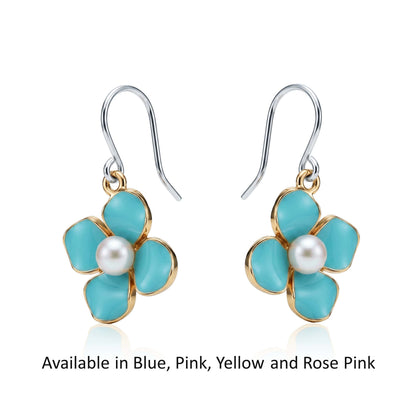 Forget-Me-Not Charm earrings available in 4 colours with a pearl in the center and a titanium hook on a white background