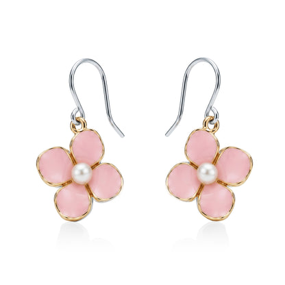 orget-Me-Not Charm earrings in pink with a pearl in the center and a titanium hook on a white background