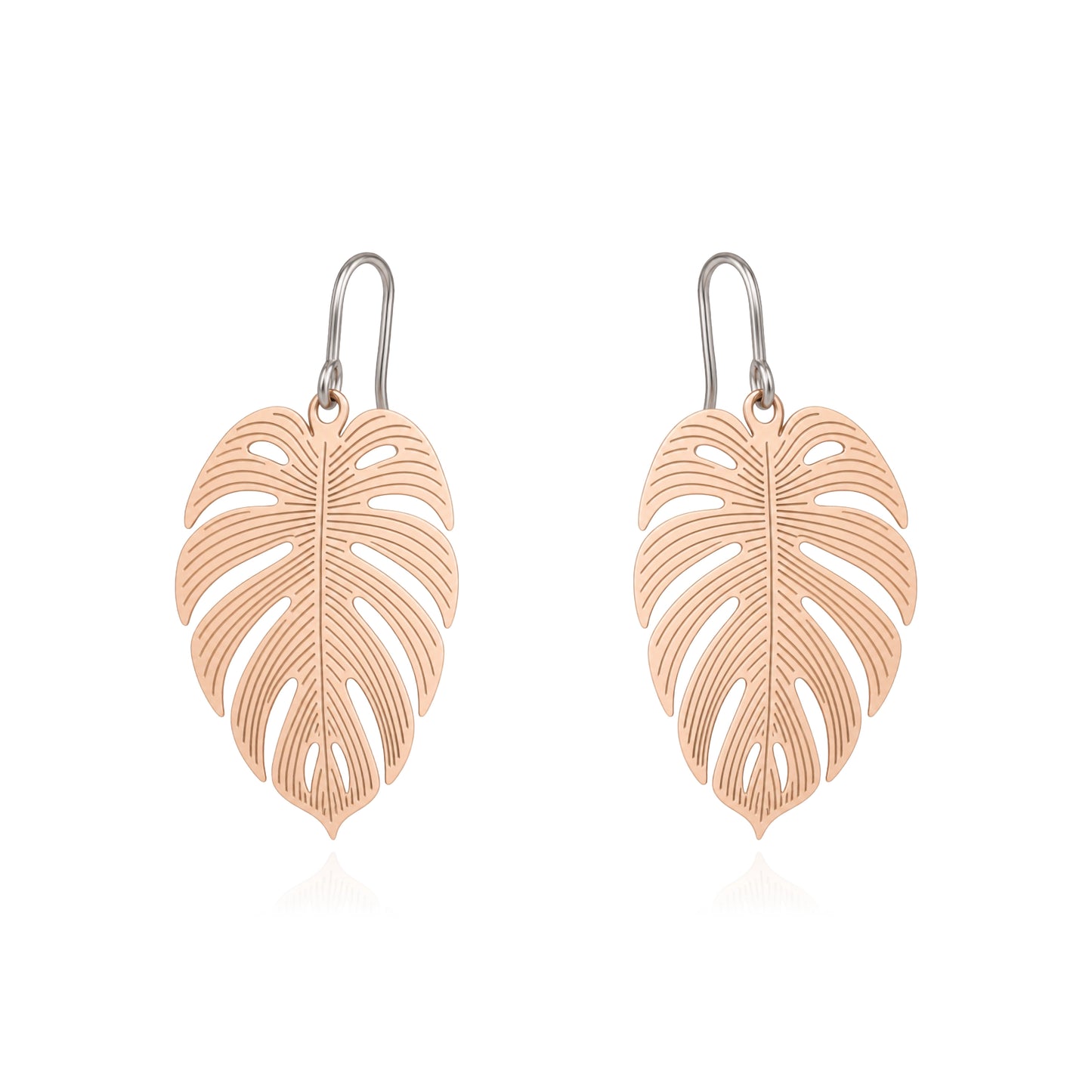 A pair of leaf-shaped drop earrings with a gold finish and titanium hooks, displayed on a clean white background.