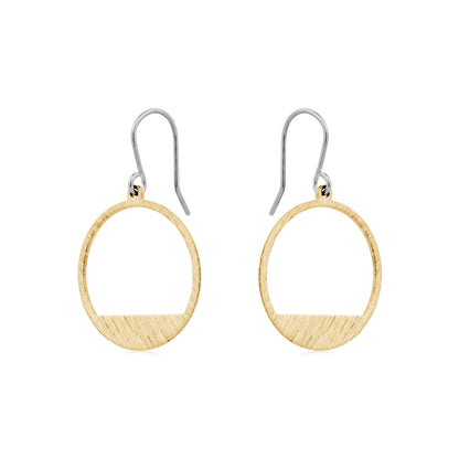 Golden rings earring with a titanium hook on a white background