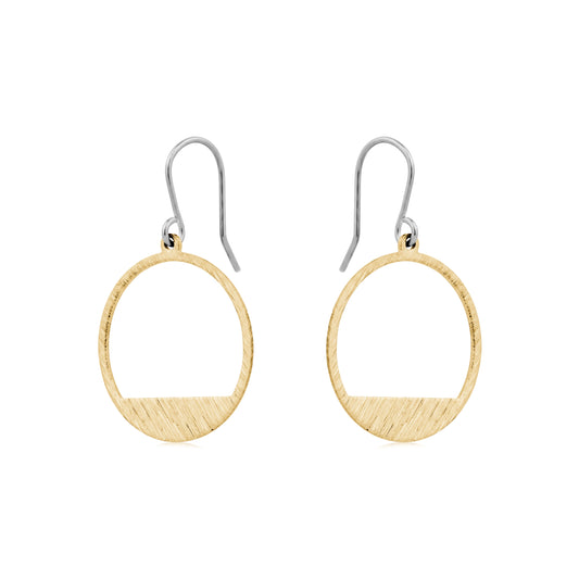 Golden rings earring with a titanium hook on a white background