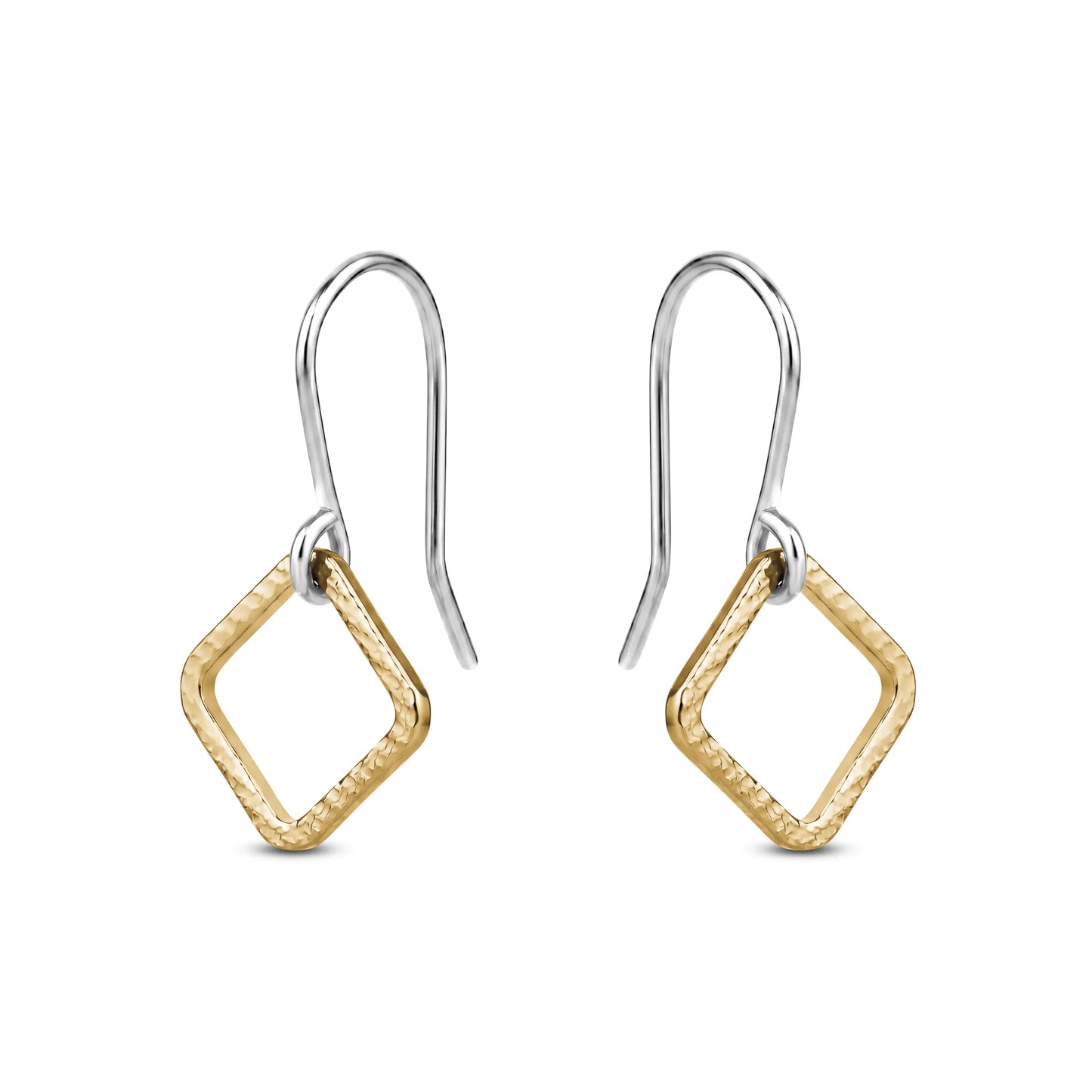 Pair of gold titaniumr earrings on a white background