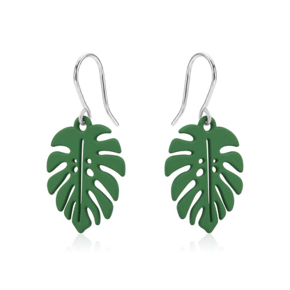 Monstera leaf earrings with a titanium hook on a white background