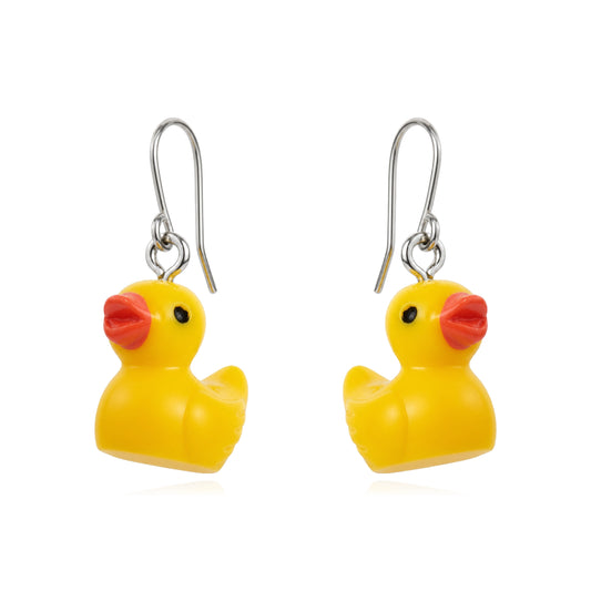 A pair of yellow rubber duck charm earrings with titanium fishhook wires and small red beaks, shown on a plain white background.