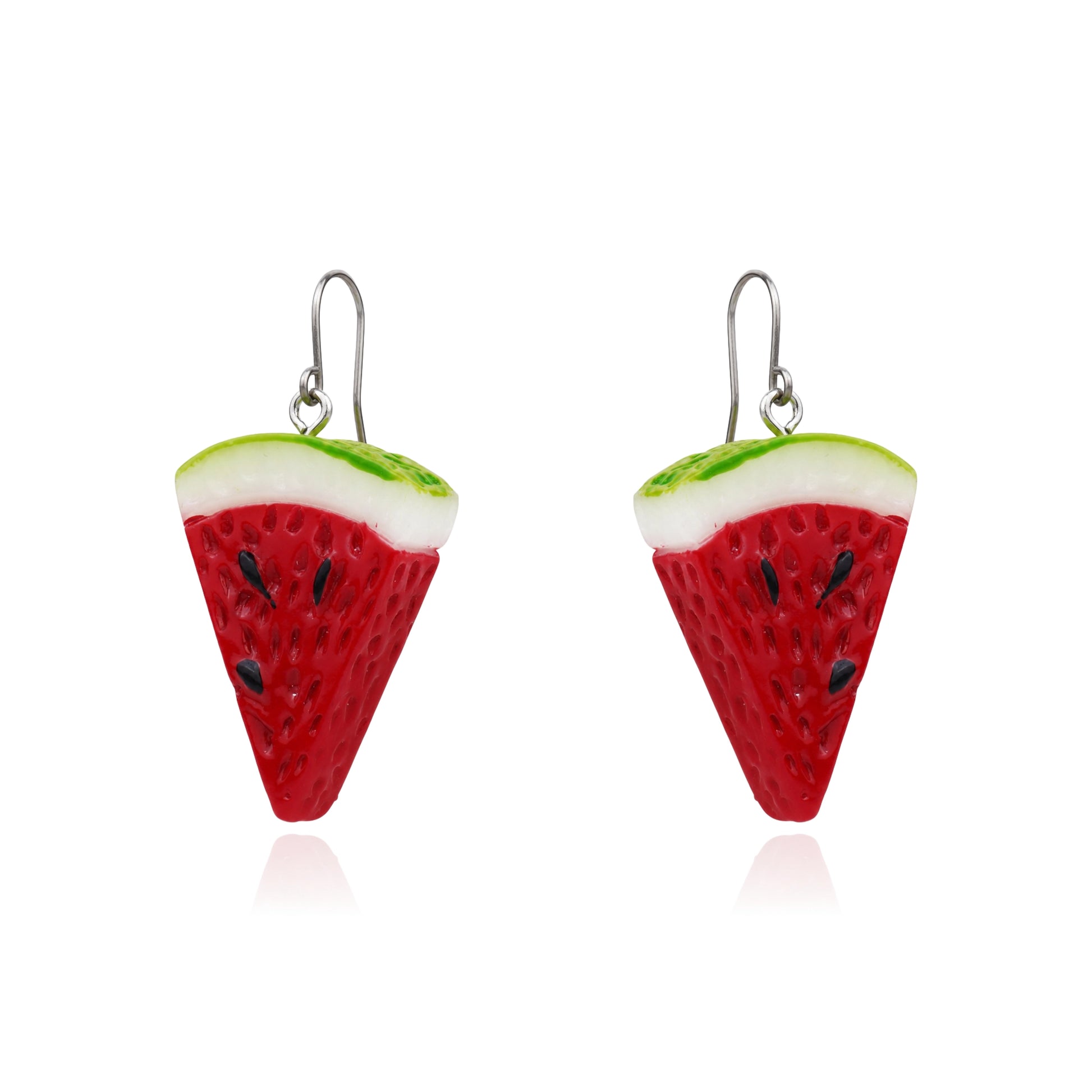 A pair of watermelon slice drop earrings with red bodies, white rinds, green edges, and small black seeds on titanium hooks, shown on a white background.