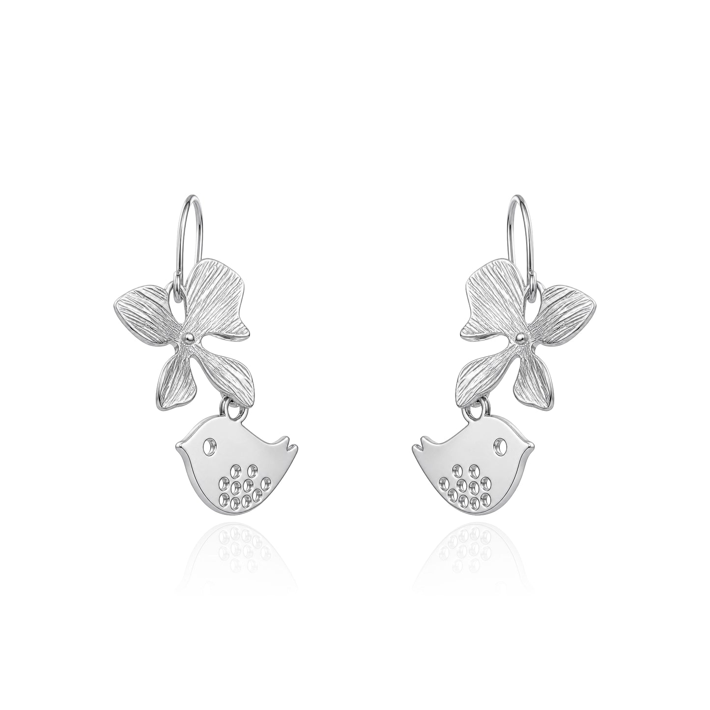 A pair of titanium dangle earrings featuring a textured flower and a small bird charm shown on a white background 