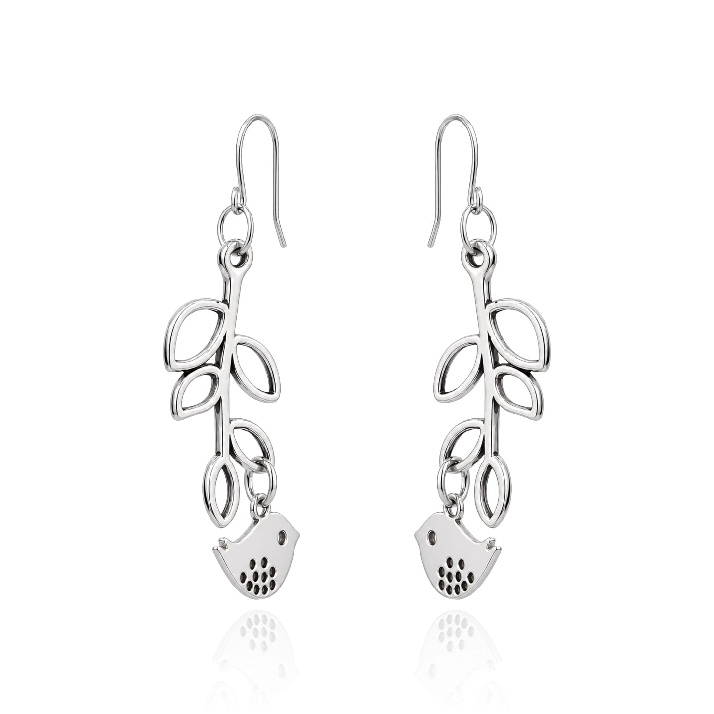A pair of titanium dangle earrings featuring a leafy vine design with a small bird charm at the bottom, shown on a white background with a soft reflection.