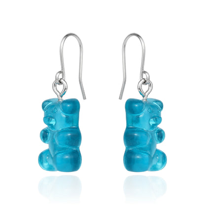 Gummy bear earrings with a titanium hook on a white background. blue
