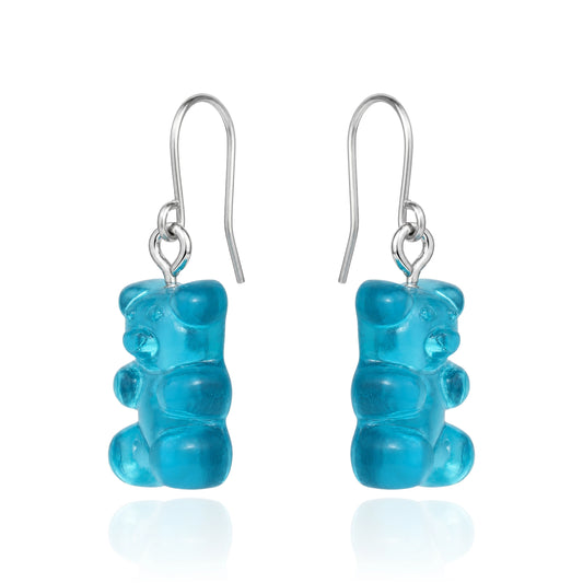 Gummy bear earrings with a titanium hook on a white background. blue