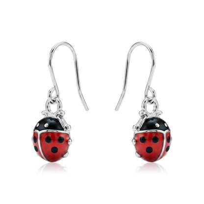 Ladybug earrings with a titanium hook on a white background