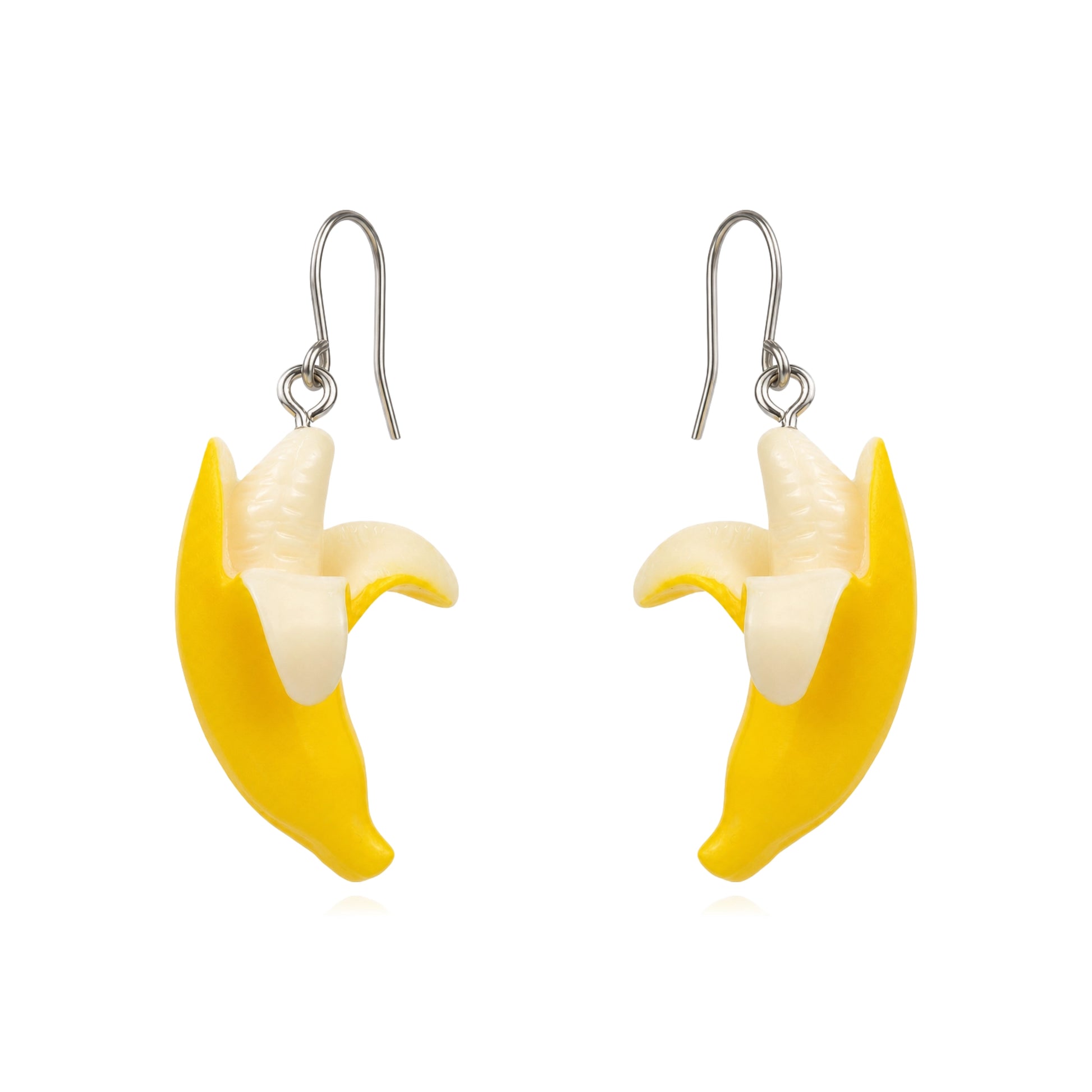 Banana drop earrings with titanium hook on a white background