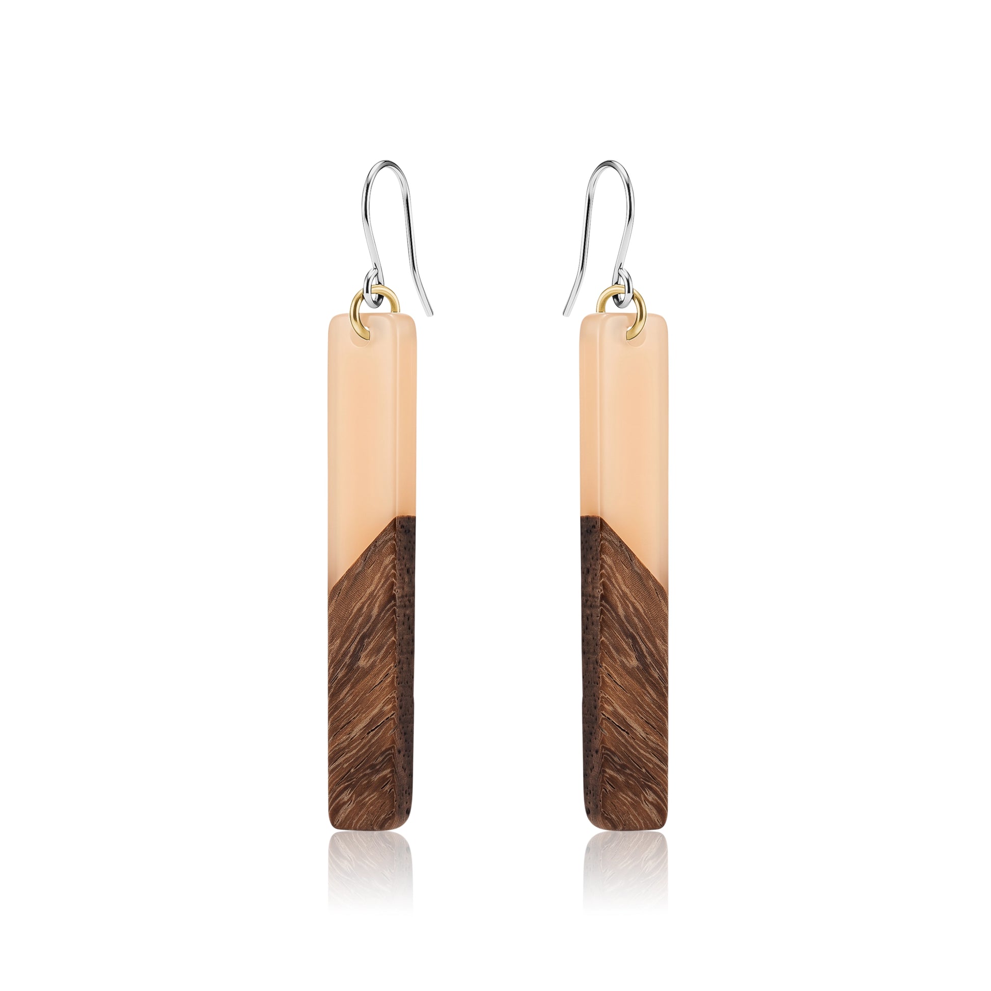 Translucent wood earrings with titanium hook on a white background 
