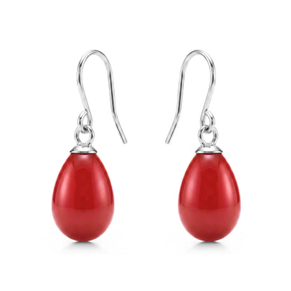 Red teardrop earrings with titanium hooks on a white background
