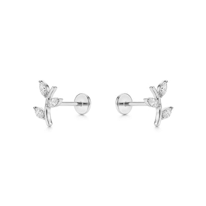 Pair of titanium earrings with leaf design on a white background