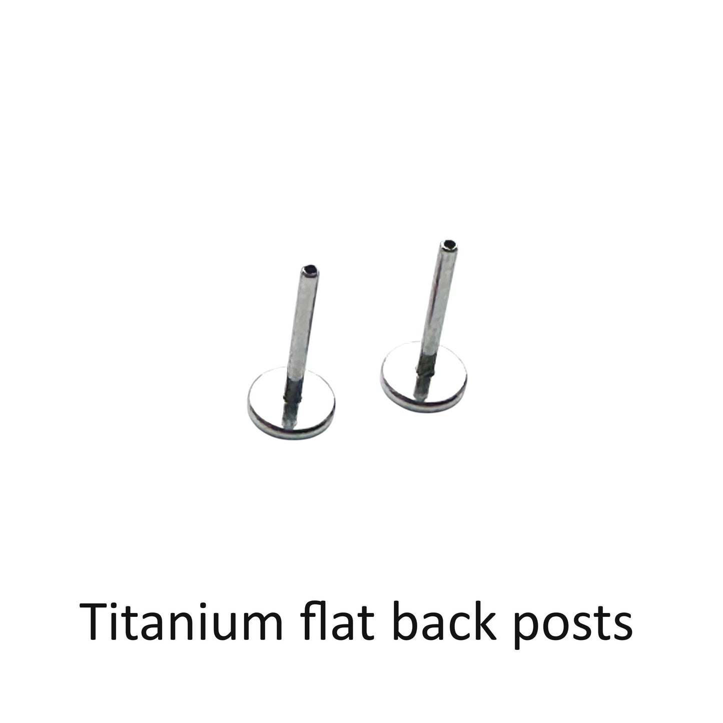 Two titanium flat back posts on a white background with text indicating the material.