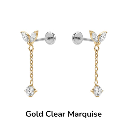 Titanium Gold and clear marquise-shaped flat back earrings on a white background