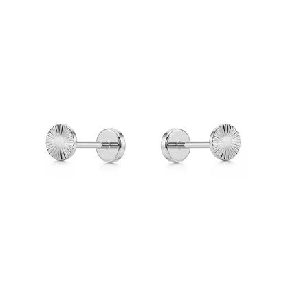 Pair of titanium stud flat back push in earrings on a white background