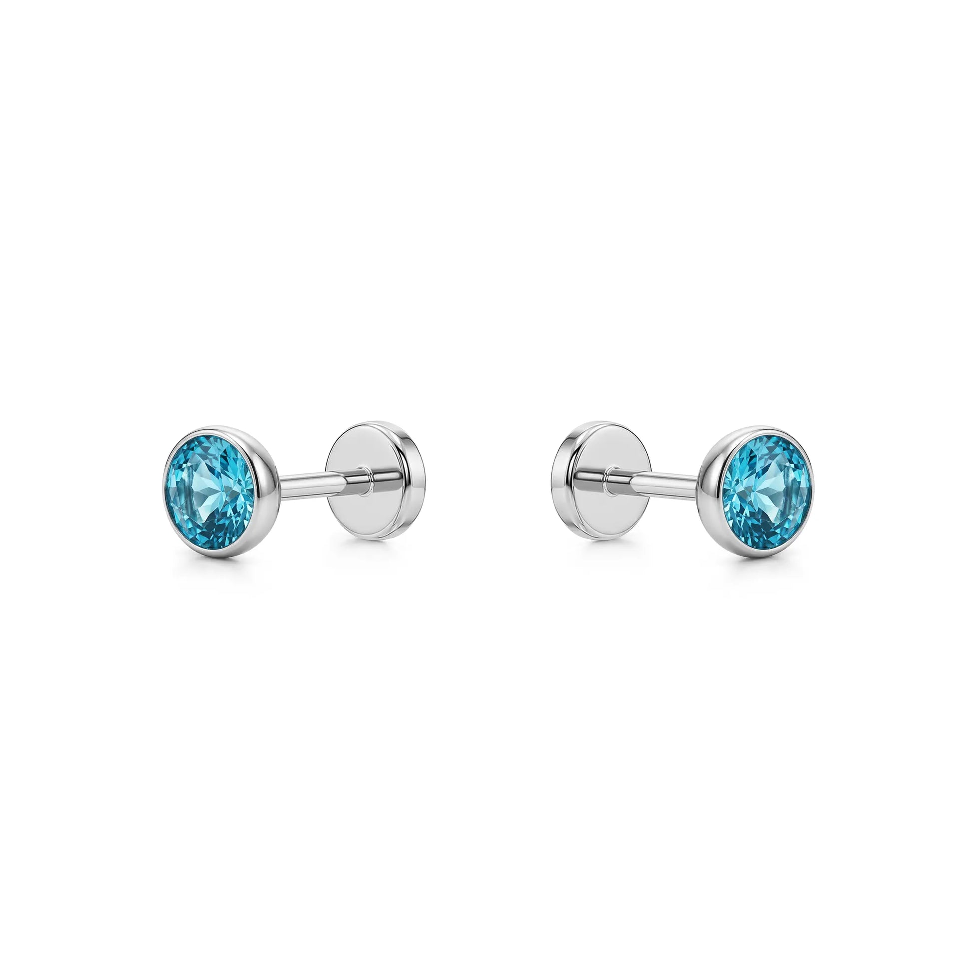 Aqua titanium 4 mm zirconium flatback  studs on a white background