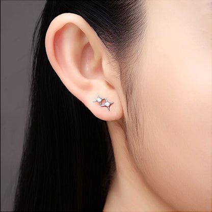 Titanium double star gem flat back stud on a white woman