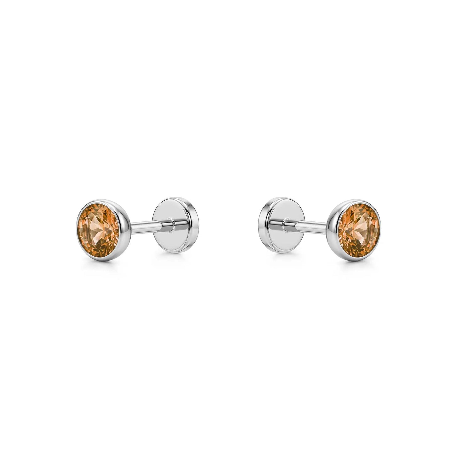 Pair of titanium stud earrings with Champagne gemstones on a white background