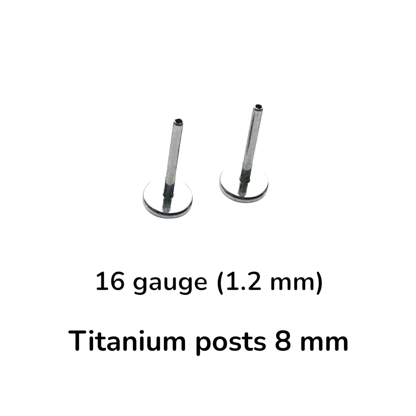 Two flat back push in posts on a white background with text reading '16 gauge (1.2 mm)' and 'Titanium posts 8 mm'.