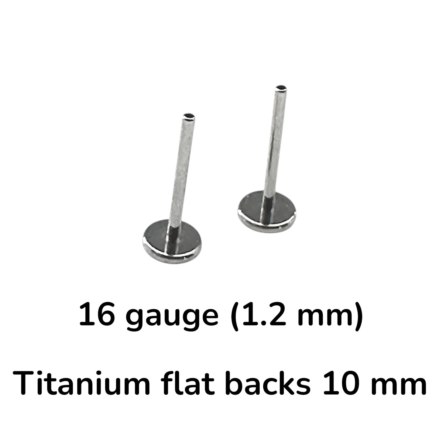Two titanium flat-back labret studs in 16 gauge (1.2 mm) size with 10 mm flat backs, shown on a white background with black text overlay detailing the specifications.